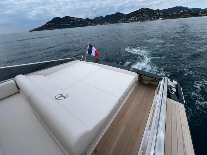 Stanislas Michel Yacht Photos Pics 2025 Itama 45 RS yacht cruising with scenic coastal backdrop.