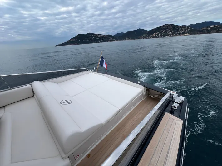 Stanislas Michel Yacht Photos Pics Luxury Itama 45 RS yacht cruising with scenic coastal backdrop, 2025 model.