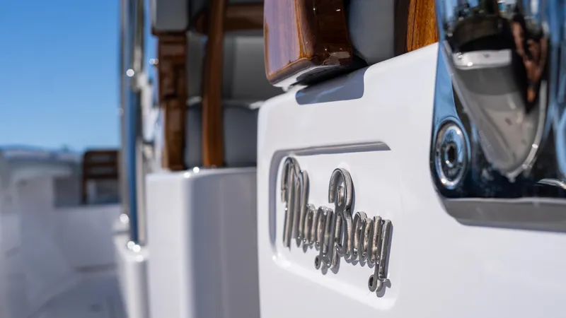  Yacht Photos Pics 2026 Mag Bay 43 CC boat with polished logo detail.