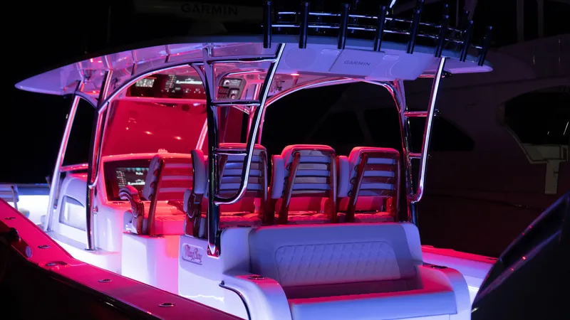  Yacht Photos Pics 2026 Mag Bay 43 CC boat interior with vibrant red lighting.