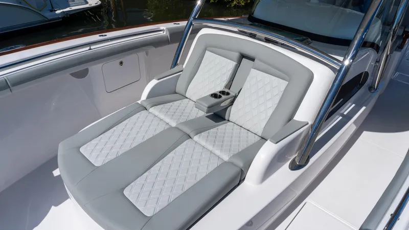  Yacht Photos Pics Luxurious seating on 2026 Mag Bay 43 CC boat with elegant gray upholstery.