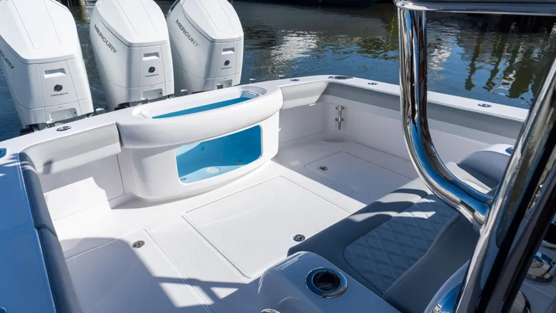  Yacht Photos Pics 2026 Mag Bay 43 CC boat interior with triple outboard engines and spacious deck.