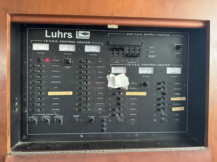  Yacht Photos Pics Luhrs 36 Convertible 2004 control panel with switches and indicators for electrical systems.
