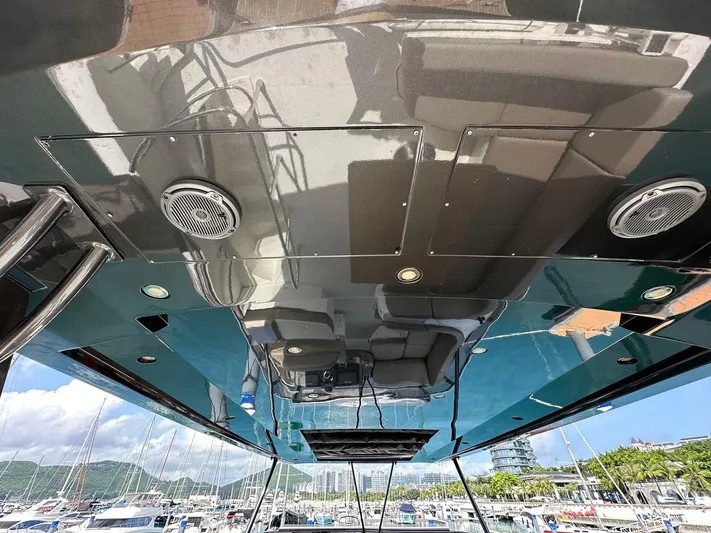  Yacht Photos Pics 2013 Marquis 630 yacht ceiling with speakers and lights, docked at marina.