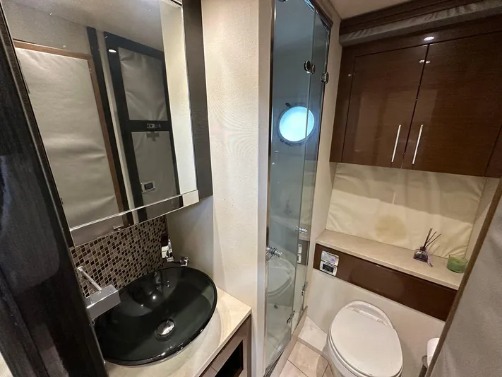  Yacht Photos Pics Luxurious 2013 Marquis 630 yacht bathroom with modern fixtures and elegant design.