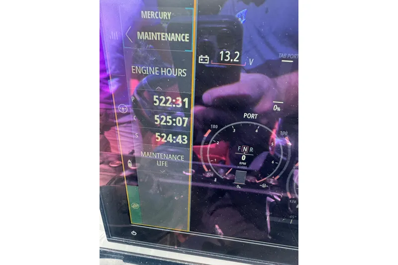  Yacht Photos Pics Display screen of 2022 De Antonio Yachts D42 Open showing engine hours and maintenance data.