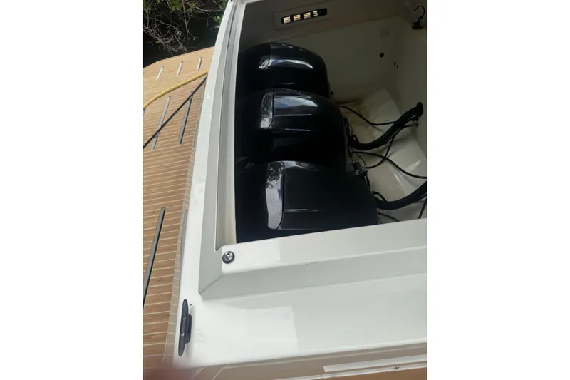  Yacht Photos Pics 2022 De Antonio Yachts D42 Open with triple outboard engines.