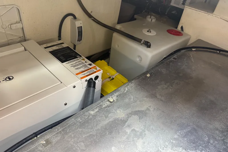  Yacht Photos Pics Engine compartment of 2022 De Antonio Yachts D42 Open, featuring equipment and storage tanks.