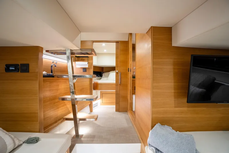  Yacht Photos Pics Luxurious interior of 2023 De Antonio Yachts D42 Open, featuring modern wood finishes and sleek design.