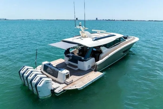  Yacht Photos Pics 2026 Scout 670 LXS luxury boat on open water, featuring sleek design and powerful engines.