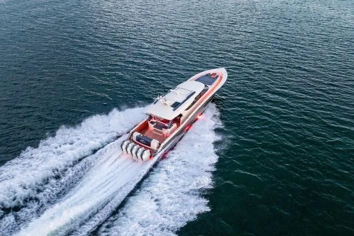  Yacht Photos Pics Aerial view of 2026 Scout 670 LXS boat cruising on open water.