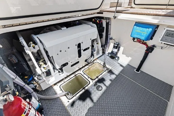  Yacht Photos Pics Engine compartment of 2026 Scout 670 LXS boat, featuring modern equipment and safety gear.