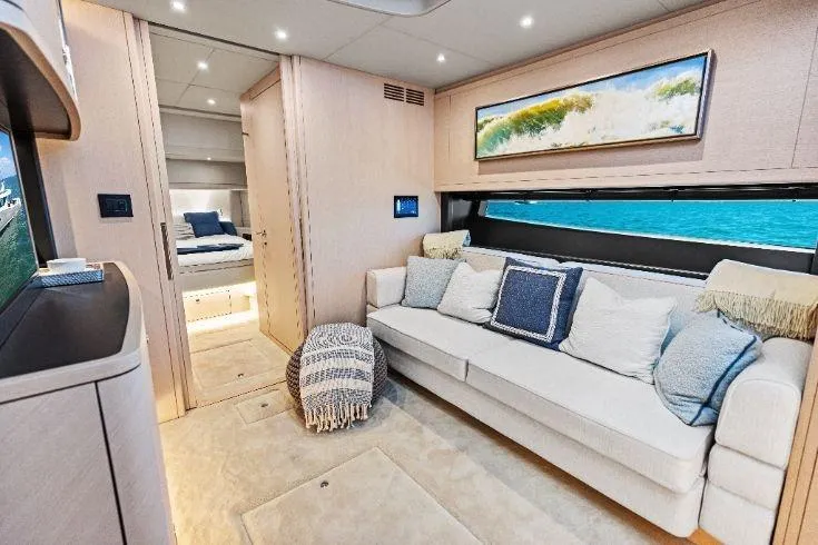  Yacht Photos Pics Luxurious interior of 2026 Scout 670 LXS yacht with elegant seating and ocean view.