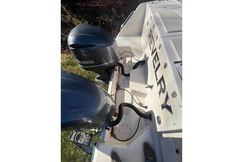 Revelry Yacht Photos Pics 2003 Grady-White Express 330 boat with dual Yamaha outboard motors.