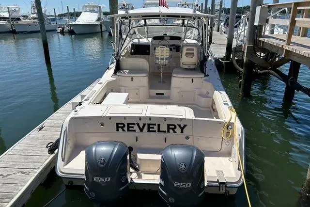 Revelry Yacht Photos Pics 2003 Grady-White Express 330 boat docked, featuring twin Yamaha engines.