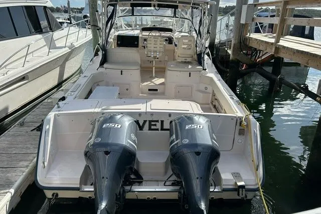 Revelry Yacht Photos Pics 2003 Grady-White Express 330 boat docked with twin Yamaha 250 engines.
