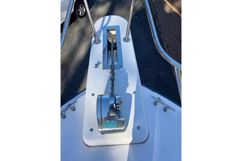 Revelry Yacht Photos Pics 2003 Grady-White Express 330 boat anchor winch and chain on deck.