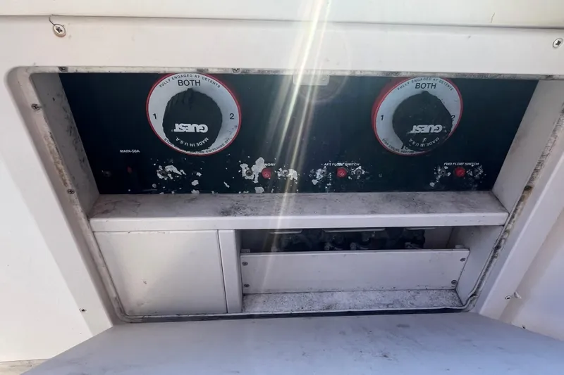 Revelry Yacht Photos Pics Control panel of a 2003 Grady-White Express 330 boat with dual switches.