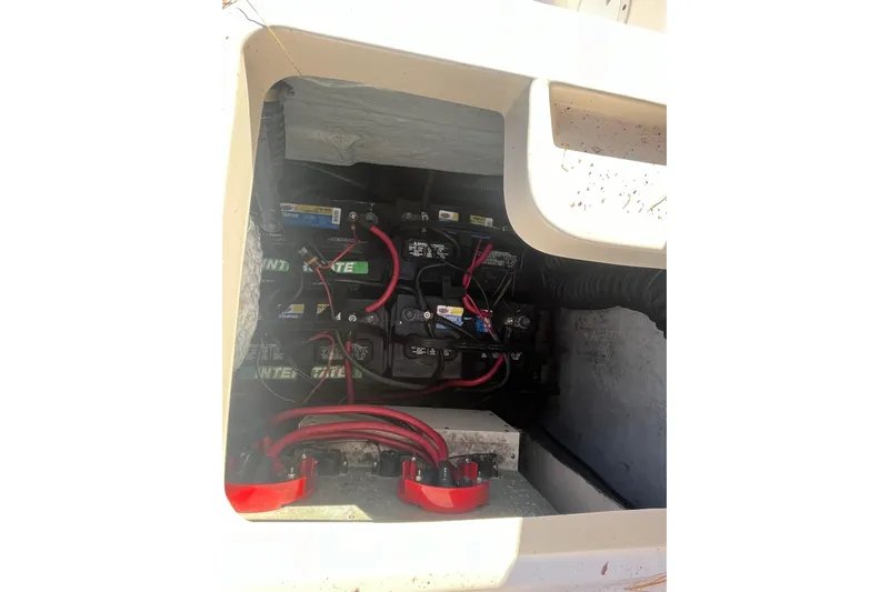 Revelry Yacht Photos Pics Battery compartment of 2003 Grady-White Express 330 boat with visible wiring.
