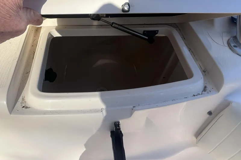 Revelry Yacht Photos Pics Open storage compartment on a 2003 Grady-White Express 330 boat.