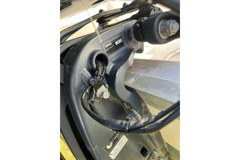 Revelry Yacht Photos Pics Close-up of Yamaha motor component on 2003 Grady-White Express 330 boat.