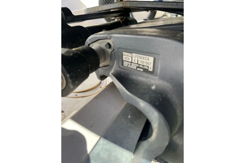 Revelry Yacht Photos Pics Close-up of Yamaha engine part on 2003 Grady-White Express 330 boat.