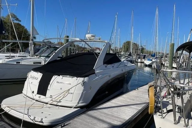 Seahorse Yacht Photos Pics 2007 Chaparral 330 Signature boat docked at marina under clear blue sky.