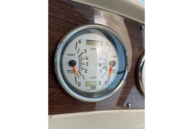 Seahorse Yacht Photos Pics Close-up of 2007 Chaparral 330 Signature boat tachometer on wooden dashboard.