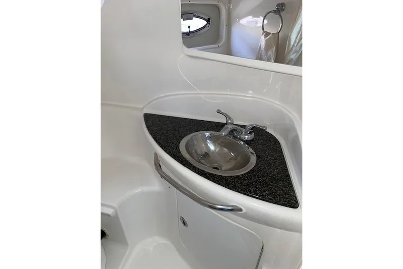 Seahorse Yacht Photos Pics 2007 Chaparral 330 Signature boat bathroom with sink and countertop.