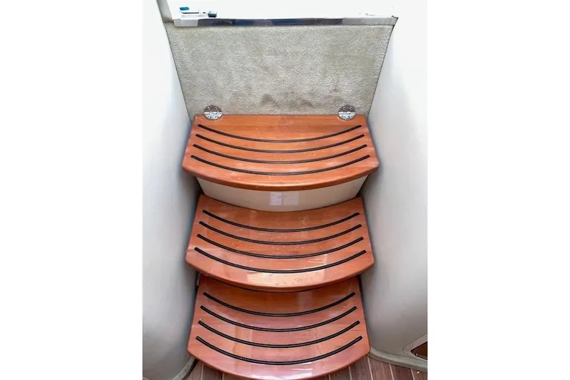 Seahorse Yacht Photos Pics Wooden steps inside 2007 Chaparral 330 Signature boat, featuring sleek design and non-slip grooves.