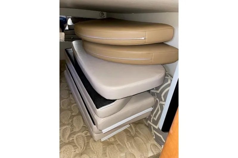 Seahorse Yacht Photos Pics Cushions stacked inside 2007 Chaparral 330 Signature boat interior.