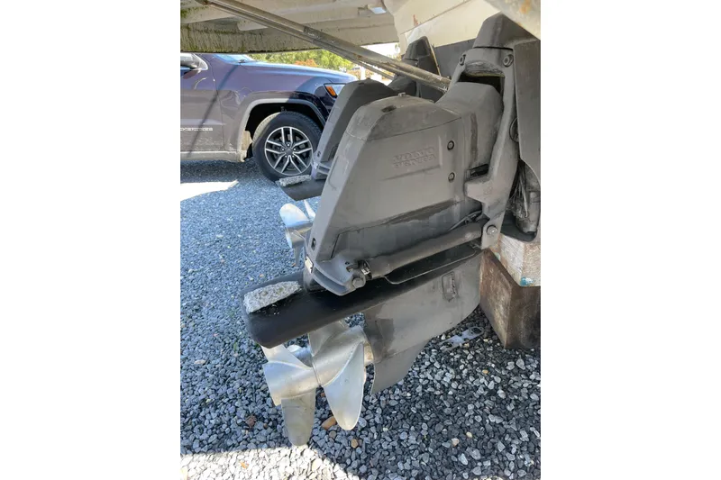 Seahorse Yacht Photos Pics 2007 Chaparral 330 Signature boat propeller and drive system on gravel surface.