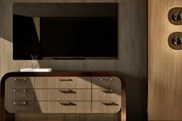 Modern wooden dresser with TV and decorative wall accents, custom design, 2026.