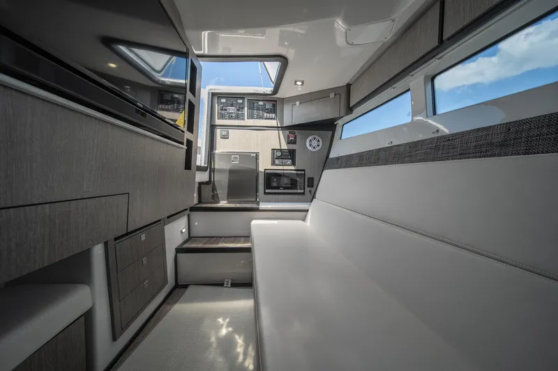  Yacht Photos Pics Luxurious interior of 2024 Monterey 385SS boat with modern amenities and sleek design.