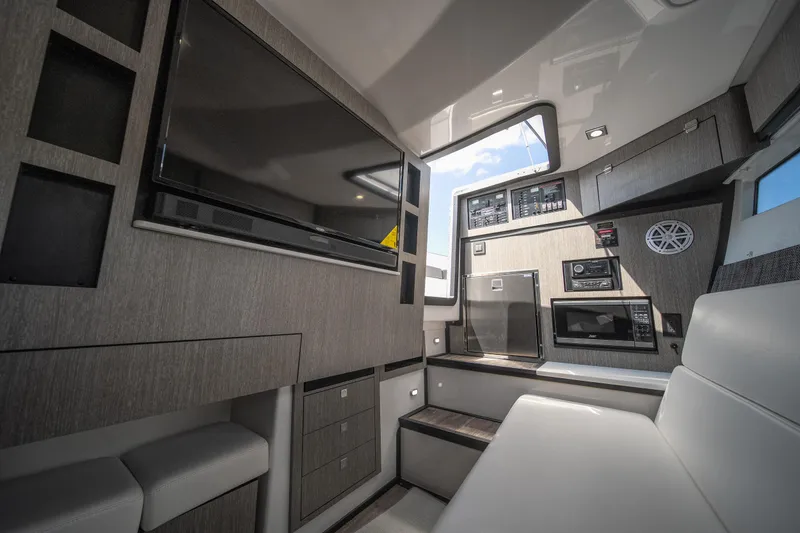  Yacht Photos Pics Luxurious interior of 2024 Monterey 385SS boat with modern amenities and sleek design.