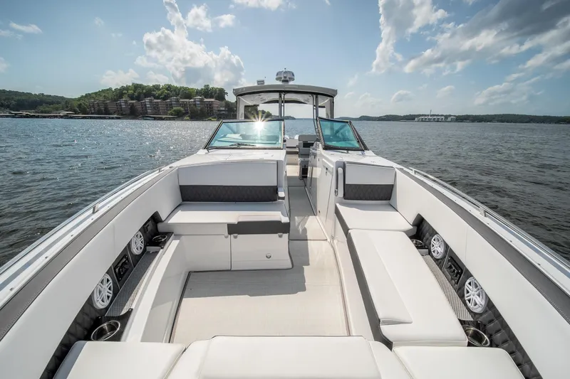  Yacht Photos Pics 2024 Monterey 385SS luxury boat interior with spacious seating on a sunny day.