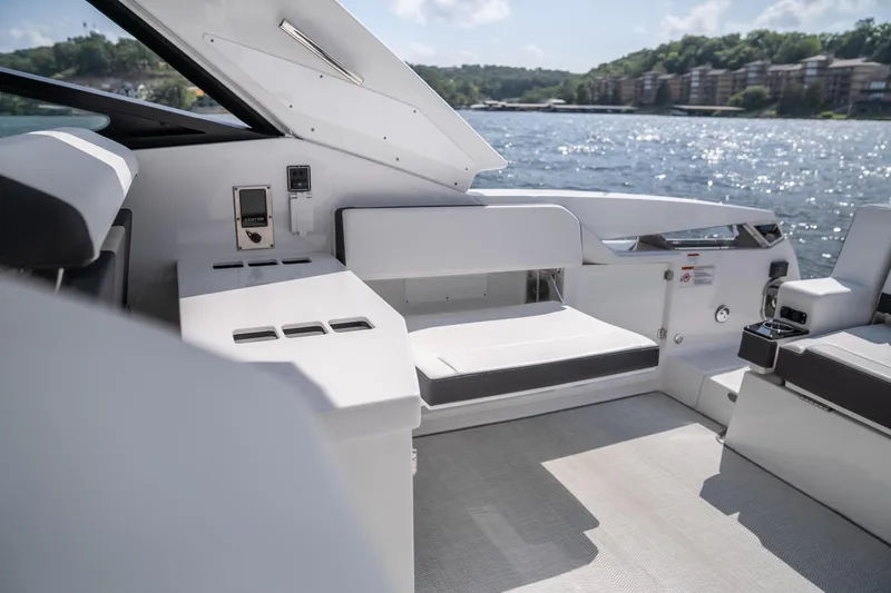  Yacht Photos Pics 2024 Monterey 385SS boat interior with sleek seating and lake view.