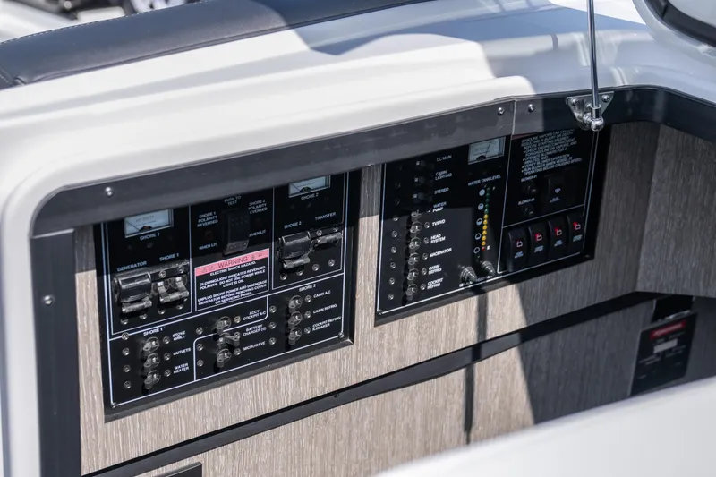  Yacht Photos Pics Control panel of 2024 Monterey 385SS boat, featuring switches and gauges.