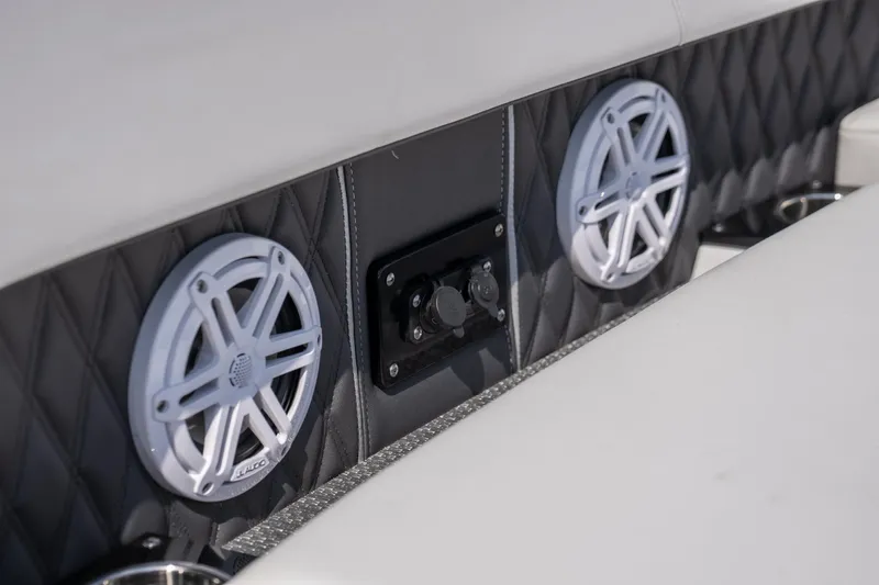  Yacht Photos Pics 2024 Monterey 385SS boat interior with speakers and quilted upholstery.