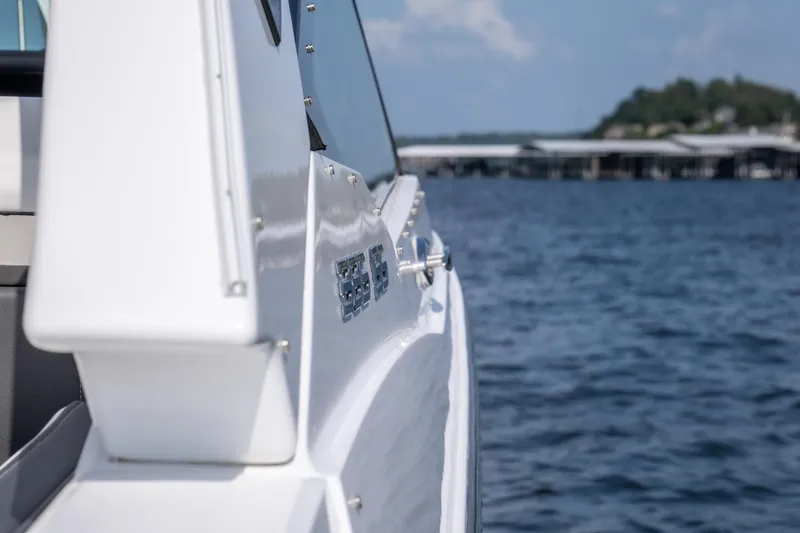  Yacht Photos Pics 2024 Monterey 385SS boat on water, showcasing sleek design and modern features.