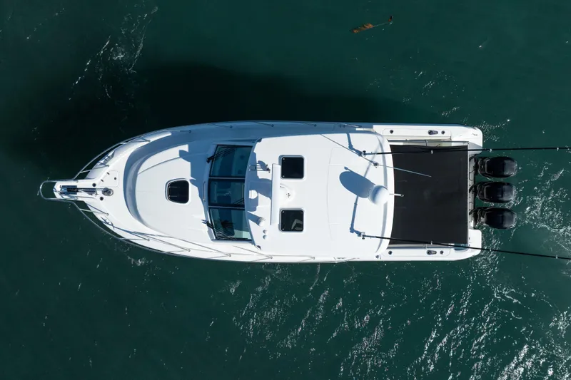  Yacht Photos Pics Overhead view of 2015 Boston Whaler 345 Conquest boat on water.