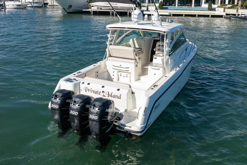  Yacht Photos Pics 2015 Boston Whaler 345 Conquest with triple outboard engines on water.