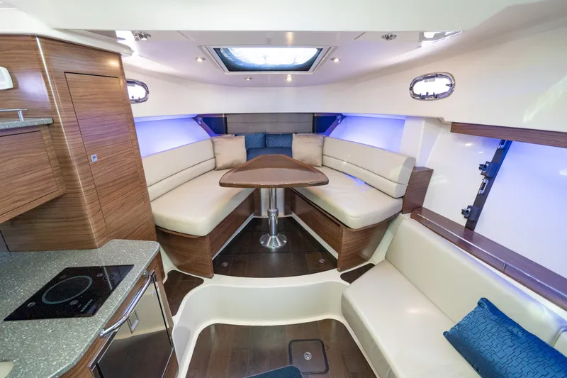  Yacht Photos Pics Luxurious interior of 2015 Boston Whaler 345 Conquest with elegant seating and modern amenities.