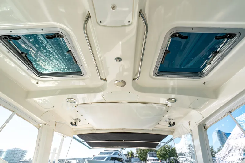 Yacht Photos Pics 2015 Boston Whaler 345 Conquest cabin ceiling with skylights and modern design.