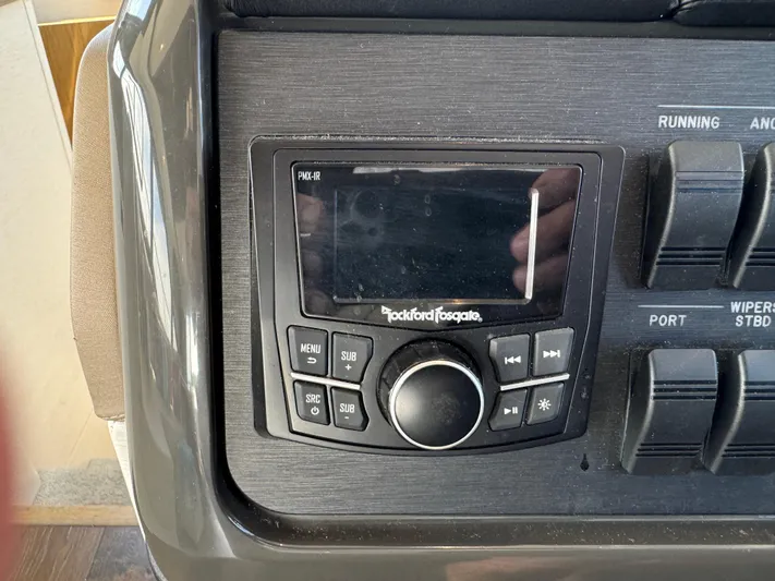 Graceful Yacht Photos Pics Control panel of a 2017 Sea Ray Sundancer 460 with Rockford Fosgate audio system.