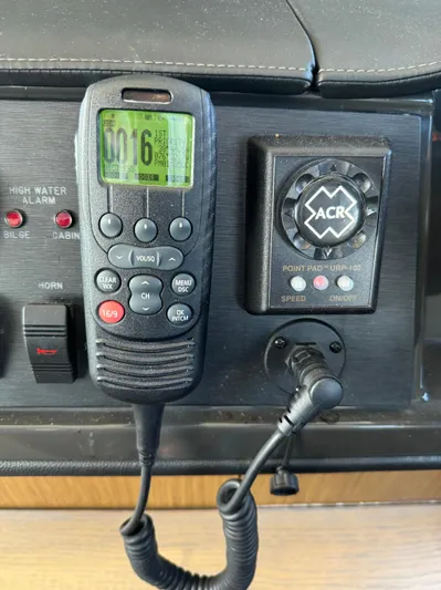 Graceful Yacht Photos Pics Control panel of a 2017 Sea Ray Sundancer 460 with radio and ACR device.