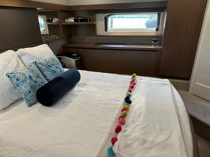 Graceful Yacht Photos Pics Luxurious cabin interior of 2017 Sea Ray Sundancer 460 yacht with elegant bedding.