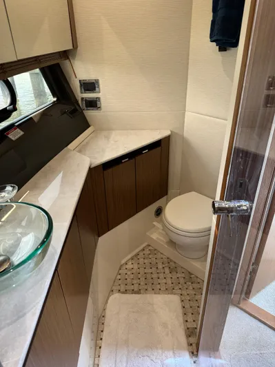 Graceful Yacht Photos Pics 2017 Sea Ray Sundancer 460 yacht bathroom with modern fixtures and wood cabinetry.