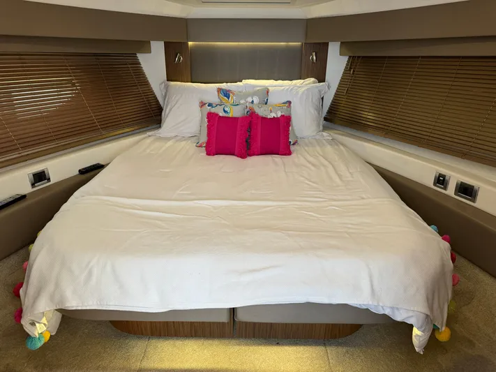Graceful Yacht Photos Pics Luxurious bedroom interior of 2017 Sea Ray Sundancer 460 yacht with plush bedding.