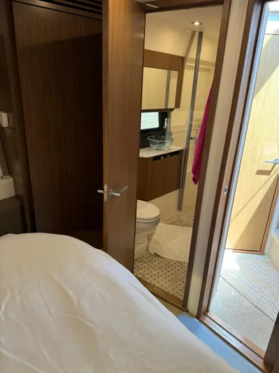 Graceful Yacht Photos Pics Interior of 2017 Sea Ray Sundancer 460 yacht showing bedroom and bathroom.